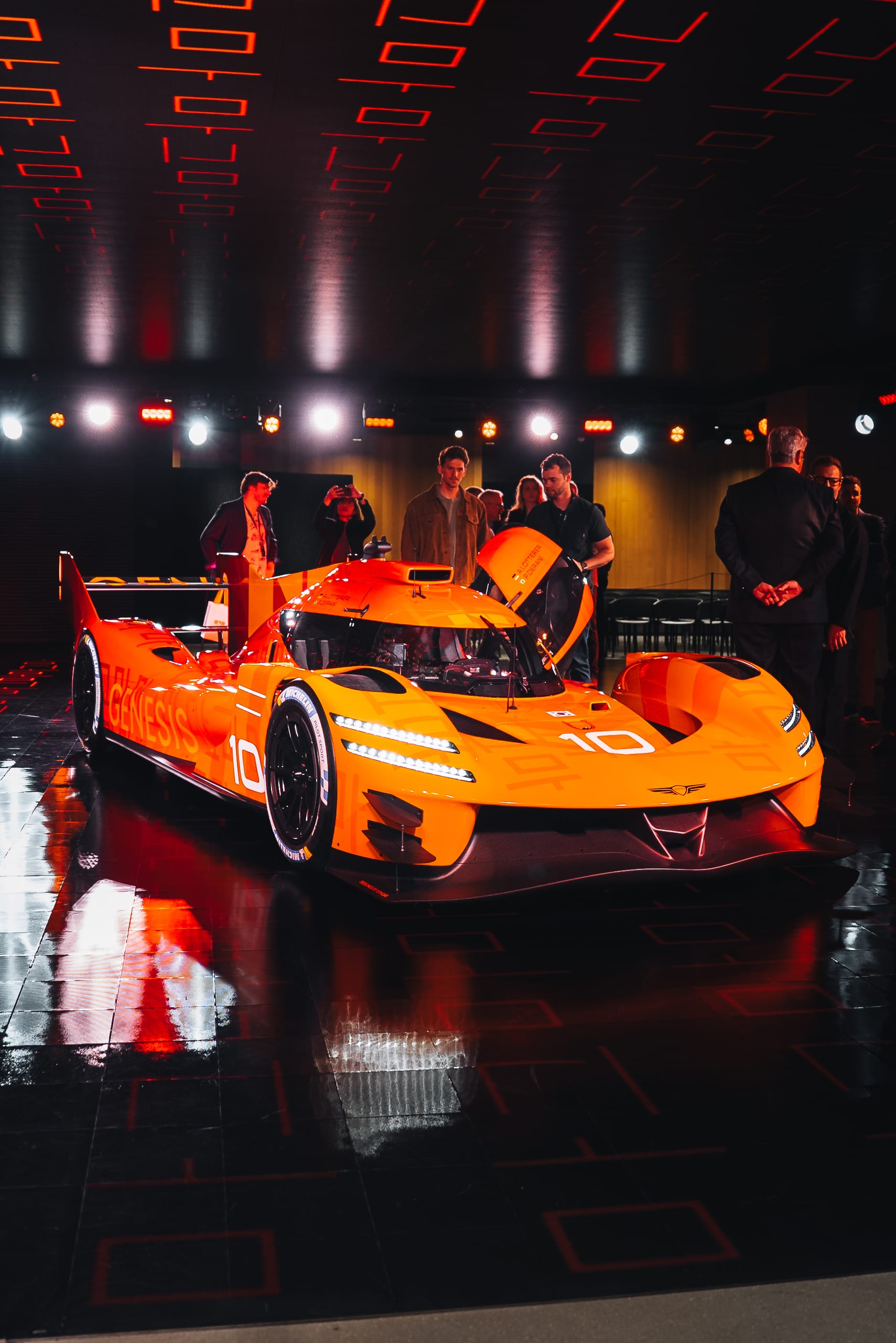 Genesis GMR 001 hypercar on display at the New York Auto Show reveal under dramatic lighting